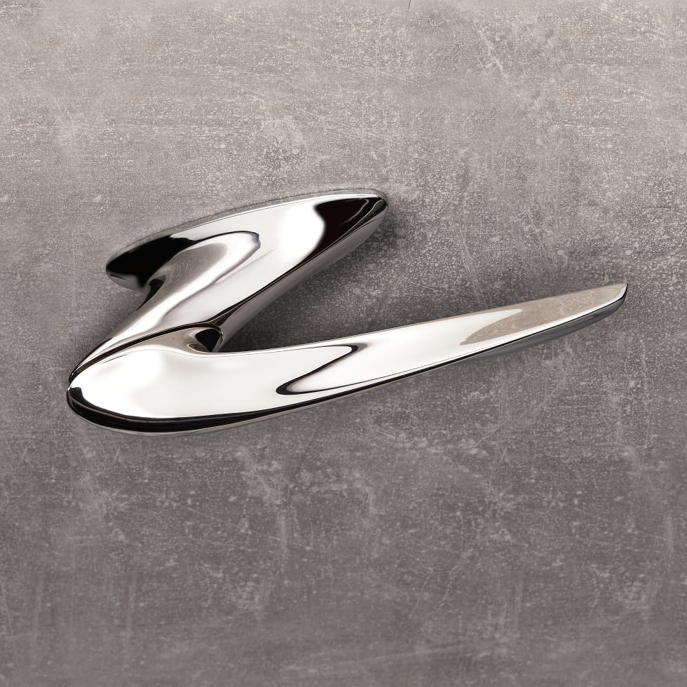 Nexxa door handle by Zaha Hadid and by izé in polished nickel finish.